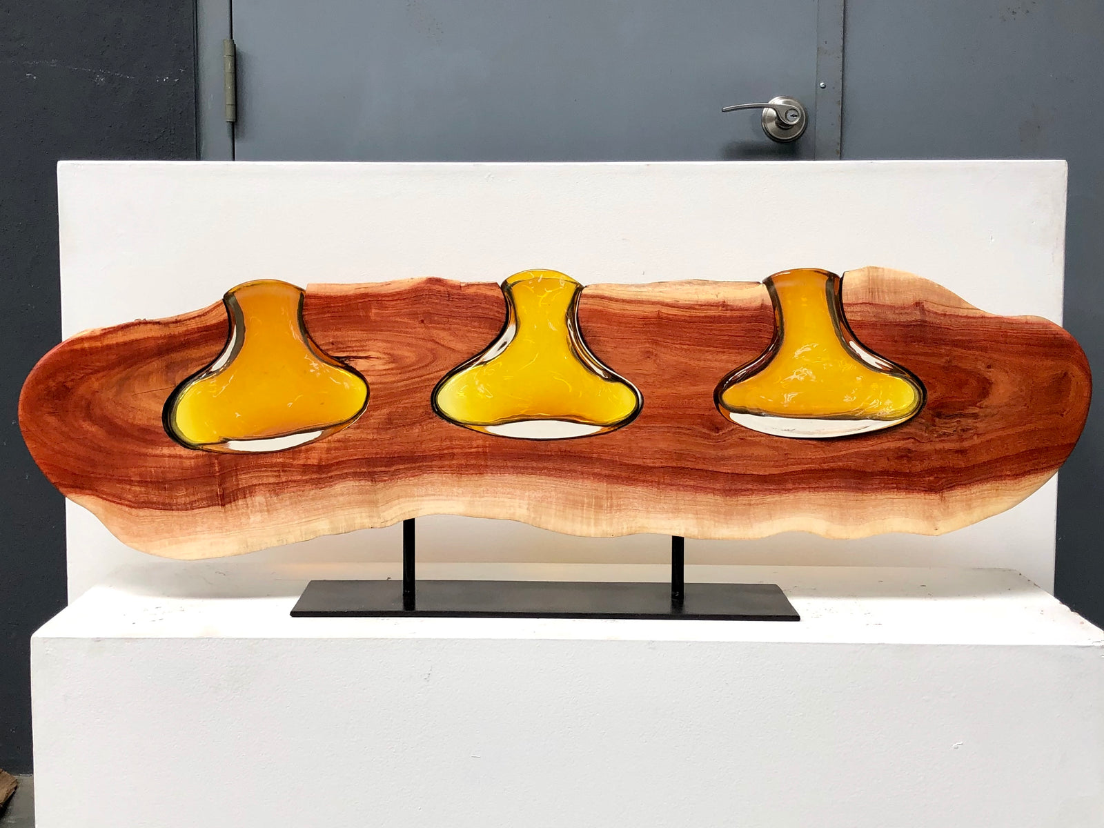 Carob with 3 topaz Ovals